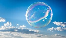 Big Soap Bubble Over A Blue Sky Background