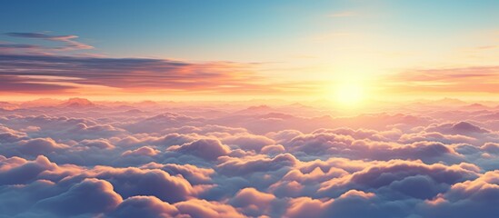 Wall Mural - panorama Beautiful sunset sky above the clouds. Aerial view