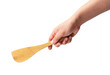 © m________k____ - Wooden kitchen spatula in hand isolated on a white background.