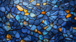 Colorful glass patterns in blue and yellow tones with black edges.