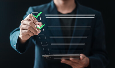 Wall Mural - Businessman filling survey form online on questionnaire with checkboxes for answer questions of test.