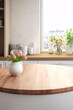 © Saran - Round Wood Tabletop on Bright Kitchen Interior Background for Product Display