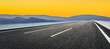 Asphalt highway road and mountain natural landscape at sunrise
