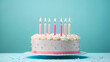 © Johannes - Birthday cake with 6 (six) candles on pastel blue background with copy space