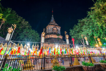 Wall Mural - the Beautiful Colorful Lanna lamp paper lantern background pattern Loi Krathong or Yi Peng Festival are northern thai style lanterns at Wat Lok Moli in Chiang Mai Thailand.