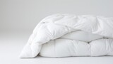 Fototapeta  - Close-up on minimalistic hotel bedding: clean white pillows, duvet blankets, bedsheets neatly placed on a bed linen