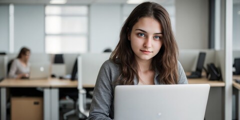 A female programmer is programming in the office. A beautiful programmer with office background and copy space.