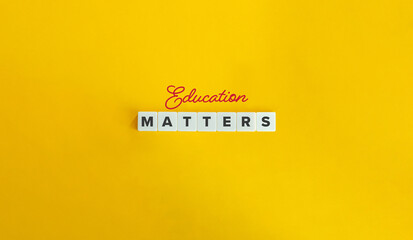 Wall Mural - education matters phrase and banner. block letter tiles and cursive text on yellow background. minim
