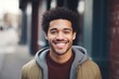 Portrait of handsome young man with afro hairstyle smiling outdoors,A mixed-race man smiling, AI Generated