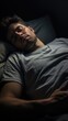 © Fly Frames - Man sleeping on soft pillow in bed at home