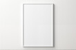 © Luc.Pro - Sleek White Frame Mockup on Plain Wall - Modern Gallery Exhibit, Clean Design Aesthetic, Creative Showcase, Minimalist Art Display, Interior Decor, Elegant Presentation