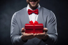 Happy Guy Hands Over A Gift In A Red Box With No Written