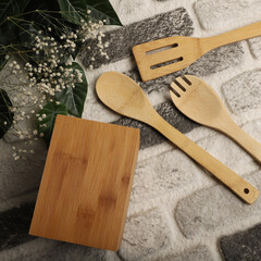 Wall Mural - Wooden Bamboo Utensil Holder, bamboo kitchen utensils, Bamboo Utensil Holder, Garden Salad, Bamboo Salad Set, close-up and concept shot. e-commerce photos, free space for writing,