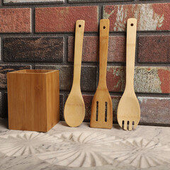 Wall Mural - Wooden Bamboo Utensil Holder, bamboo kitchen utensils, Bamboo Utensil Holder, Garden Salad, Bamboo Salad Set, close-up and concept shot. e-commerce photos, free space for writing,