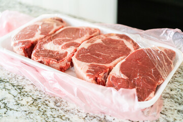 Sticker - Unpacking Rib Eye Steak in Modern Kitchen