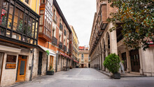 Picturesque Street In The City Of Valladolid With Arcades In Historic Buildings, Spain.