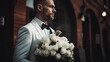 groom holding a bouquet behind his back