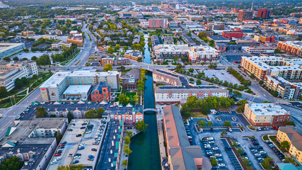 Wall Mural - Aerial Sunset Glow on Urban Riverfront Landscape