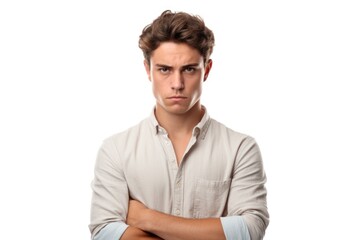 A young man confidently poses with his arms crossed, looking directly at the camera. This versatile image can be used to portray confidence, professionalism, and approachability in various contexts