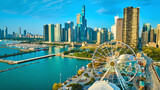 Fototapeta  - Tourism coast aerial Navy Pier Centennial Wheel sunrise with skyscrapers in Chicago, Lake Michigan