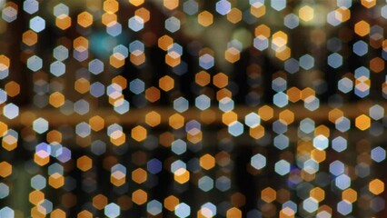 Wall Mural - sparkling christmas lights in a shopping mall. frame full of out of focus lights with people moving 