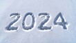 Happy new year 2024 written in snow. Generative AI illustration