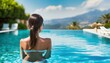 Luxury swimming pool spa resort travel honeymoon destination woman relaxing in infinity pool at hotel nature background summer holiday
