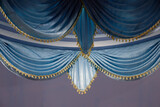 Fototapeta Paryż - blue curtain with gold ribbon