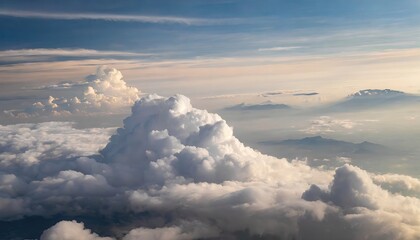 Wall Mural - High nature view large white clouds on soft sky background in the morning, View of white cloudy on the plane.

