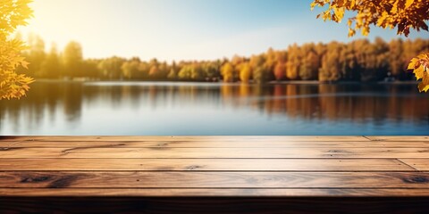 Wall Mural - Wooden table with waterside retreat. Immerse in breathtaking beauty of nature serene lakeside haven. Sun sets or rises warm rays paint sky with spectrum of colors casting golden glow over landscape