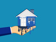 house depreciates. The hand holding the house melted like ice. vector illustration