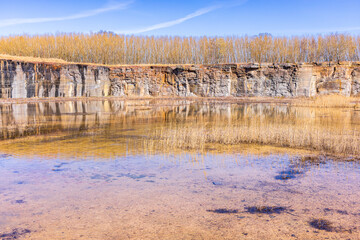 Sticker - Old limestone quarry with a rock face