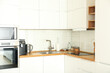 © Atlas - Modern kitchen in white colors and wooden shelves