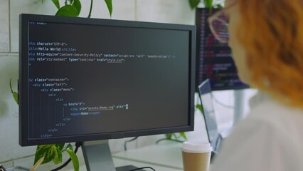 Back View. Caucasian IT Programmer Working on Desktop Computer. Writing Code in Terminal. Freelance Data Scientist Works Remotely at Office Coding Programming on Big Data Mining, AI Data Engineering.