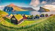 panoramic summer view of kirkjubour village with turf top houses faroe islands denmark europe wonderful morning scene of hestur island traveling concept background