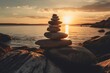 © Angus.YW - Stack of stones on the sea shore at sunset. Zen concept.