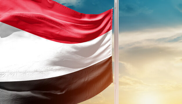 Waving flag of Yemen in beautiful sky. Flag for independence day - Image