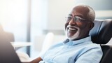 Fototapeta  - African middle aged smiling man in trendy casual clothes head shot portrait. Positive happy guy feels optimistic. Handsome confident mature good looking male laughing feeling excited close up shot..