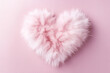 Cozy fluffy pink fur heart shape with a soft texture on light minimal background