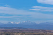 © vadimborkin - Autobahn with a mountain range in the background on a clear sunny day
