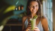 © CStock - Woman fresh smoothie applies facial skin, smiles happily At home