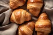 Fresh croissants with a crispy crust close-up view from above. Classic French dessert. Bakery, baking sweet baked goods