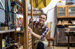 © pikselstock - Female carpenter working in her workshop
