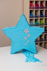 Wall Mural - blue star piñata toy, birthday piñata