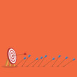 Business challenge failure and success concept. Blue arrows missed hitting target and only red one hits the center.