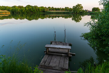 Wall Mural - Fishing spot in the village. Background with selective focus and copy space