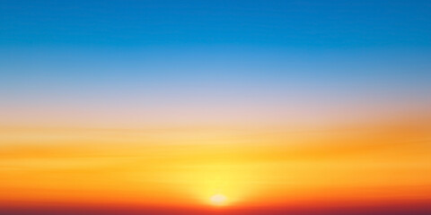 Wall Mural - abstract gradient sunrise in the sky with cloud and blue mix orange natural background.