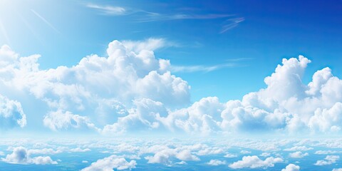 Wall Mural - beauty of summer sky with scattering of fluffy white clouds against backdrop of bright blue. scene e