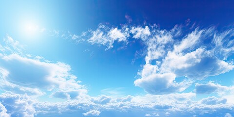 Wall Mural - beauty of summer sky with scattering of fluffy white clouds against backdrop of bright blue. scene e