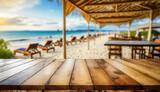 Fototapeta  - Empty wooden table with blurry beach restaurant background . ai generated